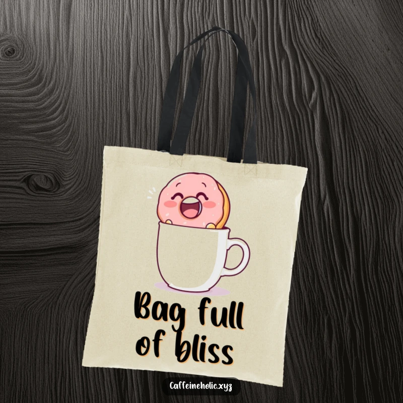 Funny tote bag illustrated with a delighted donut character submerging itself in a mug, perfect for carrying daily items.